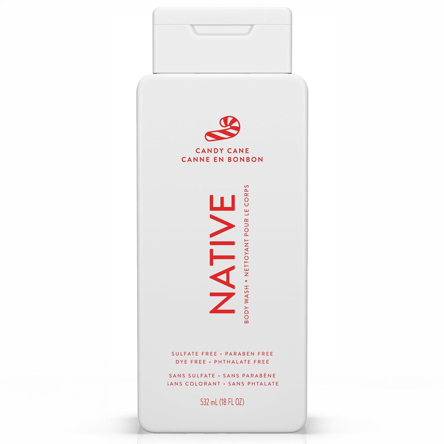 Front of a white Native Candy Cane body wash bottle with red bilingual text and candy cane graphic on white.