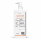 A white pump bottle of native shampoo shown from the back, featuring a white label with orange borders and black text listing ingredients and manufacturer details, on a clean white background.