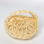 Round sisal body scrubber on a white surface, shown from the back to display the woven hand strap.