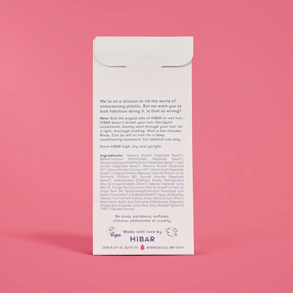 The back of a white paper envelope package for HiBAR, showing printed details and logos against a pink background.