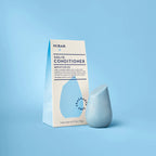HiBar solid conditioner MOISTURIZE bar alongside its packaging and  is fragrance-free.
