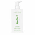 Front of white pump bottle of Native Cucumber & Mint Volumizing Conditioner on a white background.