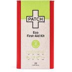 PATCH Eco First-Aid Kit green and cream packaging showing 77 items inside including bandages, scissors, tweezers, and cleaning buds with red metal tin