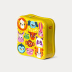 Angled side view of the closed yellow metal tin featuring colourful cartoon animal face illustrations on the lid.