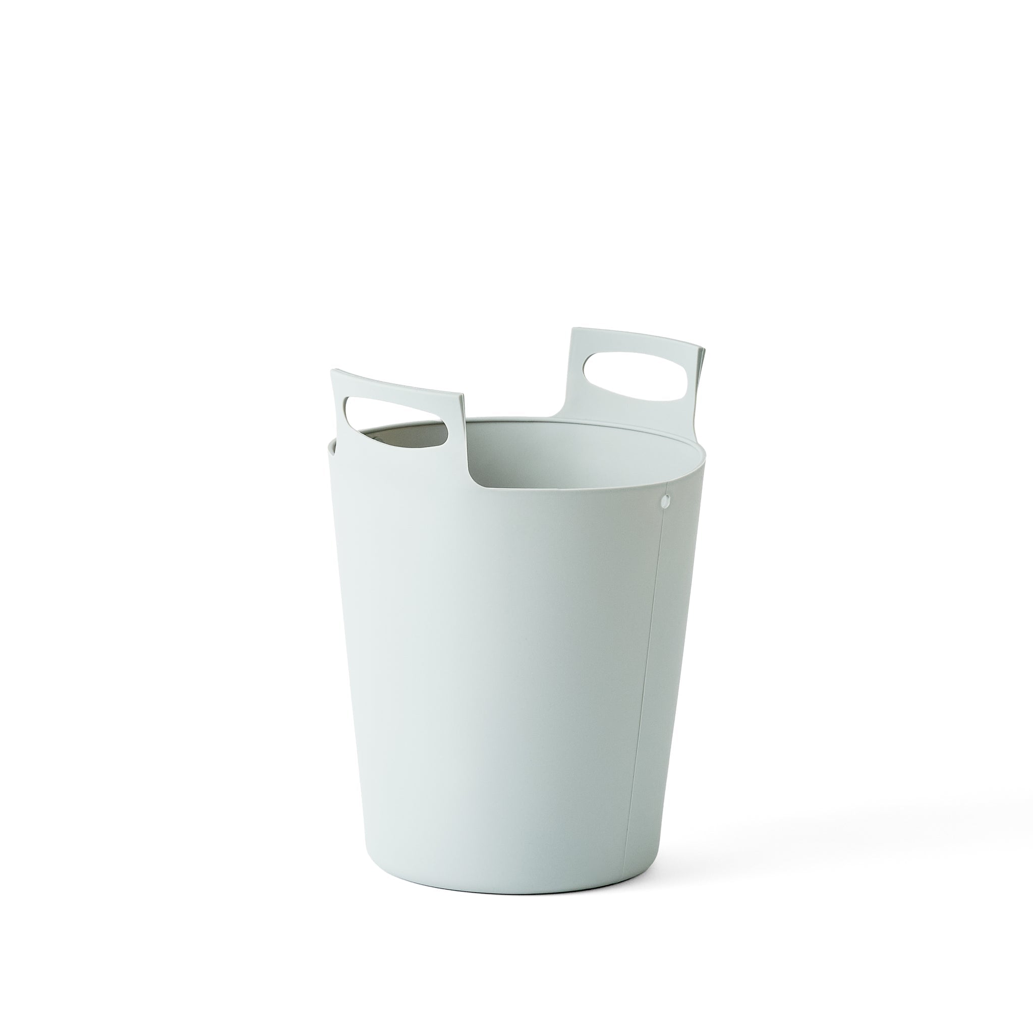 A grey Bamboozle Martha Stewart silicone liner bag with two cut-out handles, shown against a plain white background.