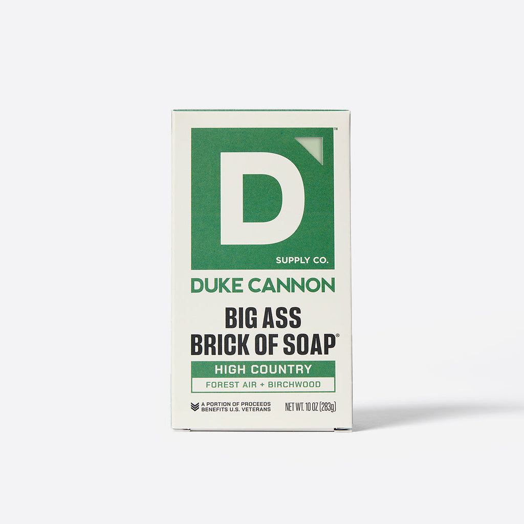 Front view of the white and green packaging box for Duke Cannon Big Ass Brick of Soap High Country.
