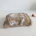 Hemp soap bag with lathered bar soap showing exfoliating texture and foam creation