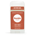 Front view of a white Humble Sweet Amber aluminum-free deodorant container with a terracotta-colored label, on white.