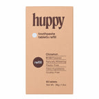 A peach-coloured box for huppy cinnamon toothpaste tablets refill, with product details printed in brown text.