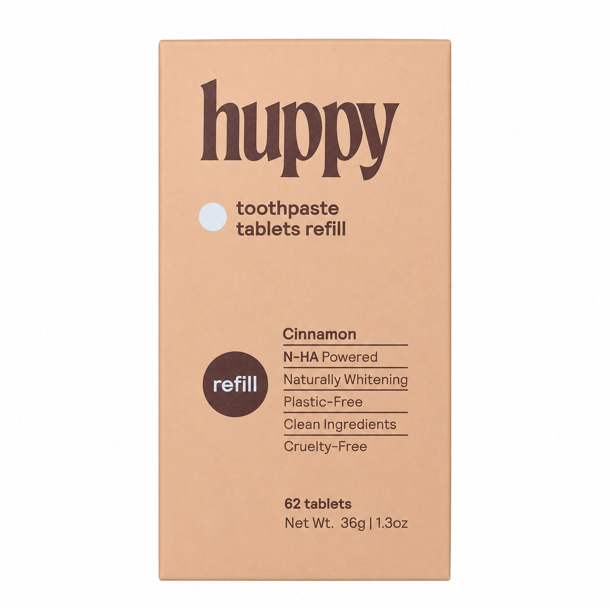 A peach-coloured box for huppy cinnamon toothpaste tablets refill, with product details printed in brown text.