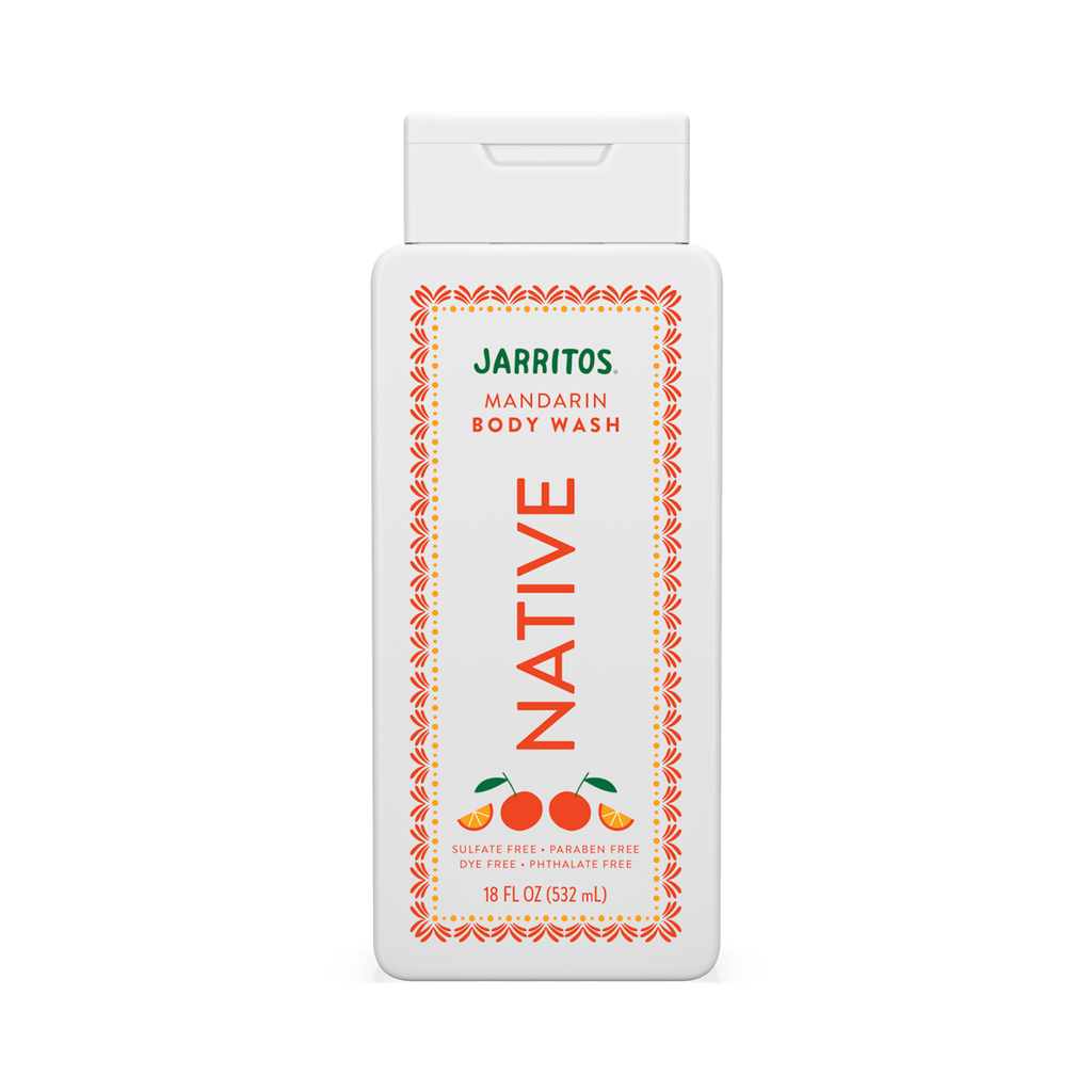 Front of the white Native Jarritos Mandarin body wash bottle with orange patterned borders on black.