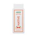 Front of the white Native Jarritos Mandarin body wash bottle with orange patterned borders on black.