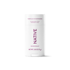 White stick of Native Vanilla & Cashmere deodorant with purple lettering centered against a solid black background.