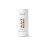 Front view of Native Whole Body coconut and vanilla deodorant stick in a white container on a white background.