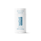 Front view of Native Whole Body Deodorant stick in Sea Salt & Cedar scent, centered on a black background.