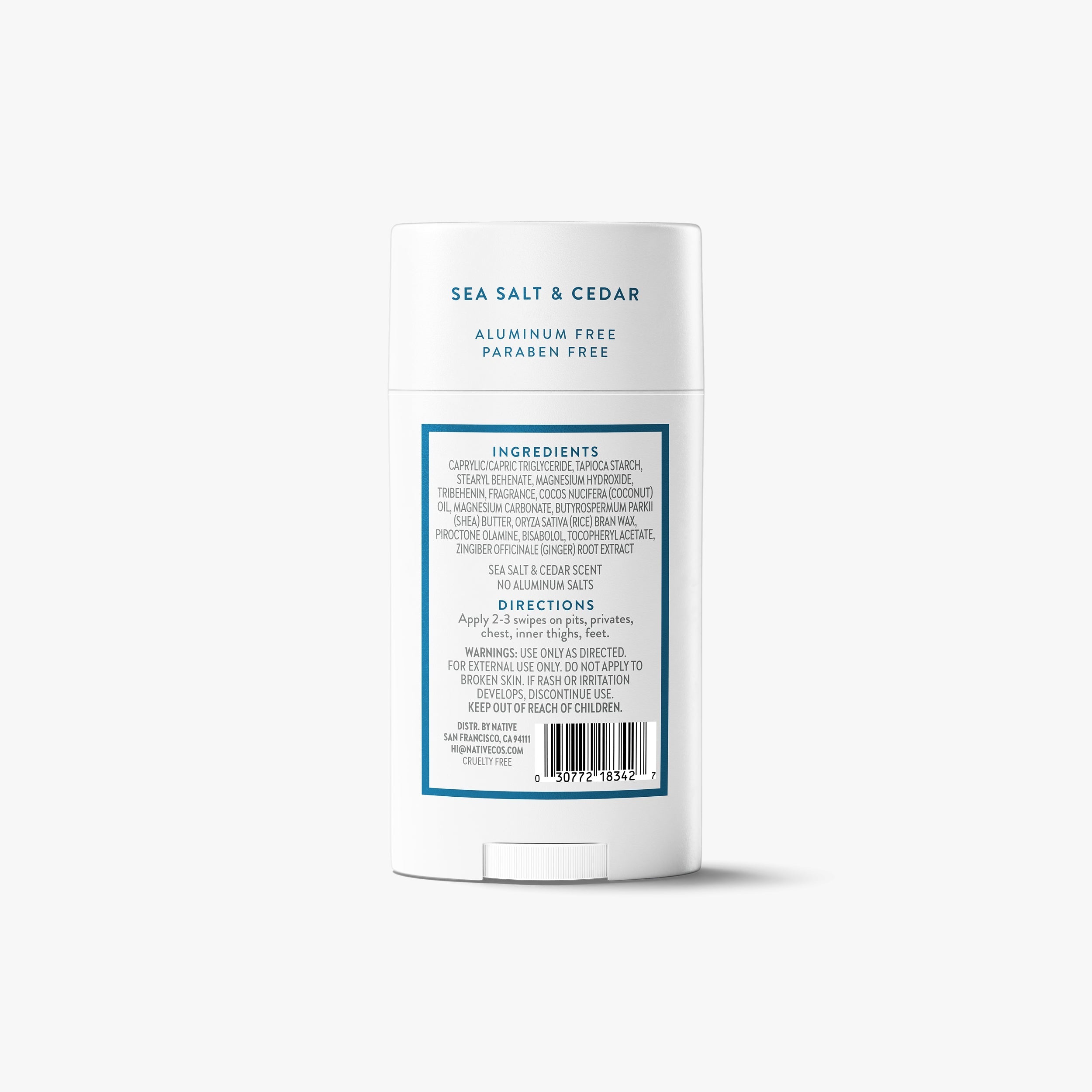 Back label of a Native Whole Body Deodorant stick showing ingredients and directions, on a grey background.