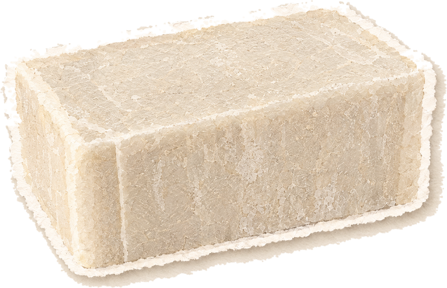 Paper cut-out of a plain warm white bar of tallow soap