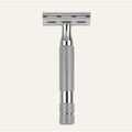 Rockwell 6C double-edge safety razor in white chrome finish displaying polished metal construction with textured grip handle
