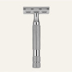 Rockwell 6C double-edge safety razor in white chrome finish displaying polished metal construction with textured grip handle