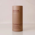 Blackberry Betty Deodorant Stick on a neutral surface showing compostable paperboard tube.