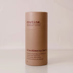 Blackberry Betty Deodorant Stick on a neutral surface showing compostable paperboard tube.