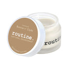 Open Routine Bonnie N' Clyde deodorant jar displaying smooth cream texture and brown lid label showing unscented natural deodorant product details