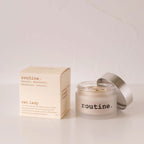 routine Cat Lady natural deodorant jar - cream-coloured glass container with silver lid next to branded cardboard box showing 58g vegan formula for sensitive skin