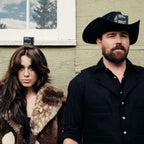 Country-style couple in black outfits representing the rebellious, authentic aesthetic of Routine Johnny's Cash deodorant's target audience inspired by outlaw culture