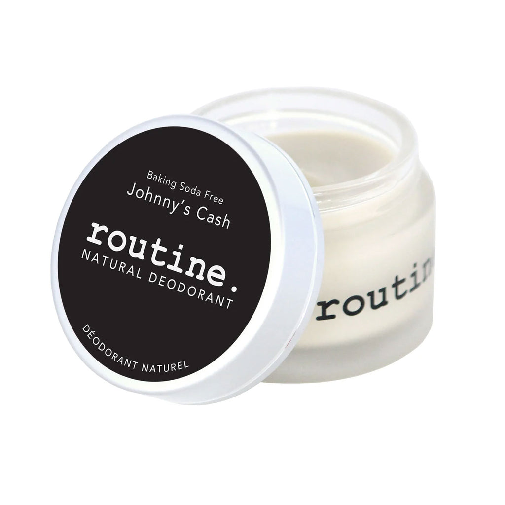 Routine Johnny's Cash deodorant jar opened showing smooth cream texture - baking soda free magnesium formula for extra sensitive skin with woodsy masculine scent