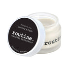 Routine Johnny's Cash deodorant jar opened showing smooth cream texture - baking soda free magnesium formula for extra sensitive skin with woodsy masculine scent