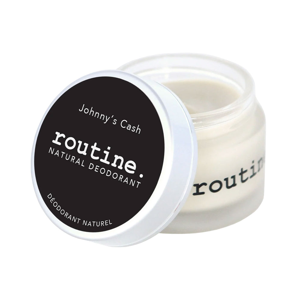 Routine Johnny's Cash vegan deodorant jar opened showing smooth cream texture - beeswax-free plant-based formula with woodsy masculine scent and cruelty-free protection