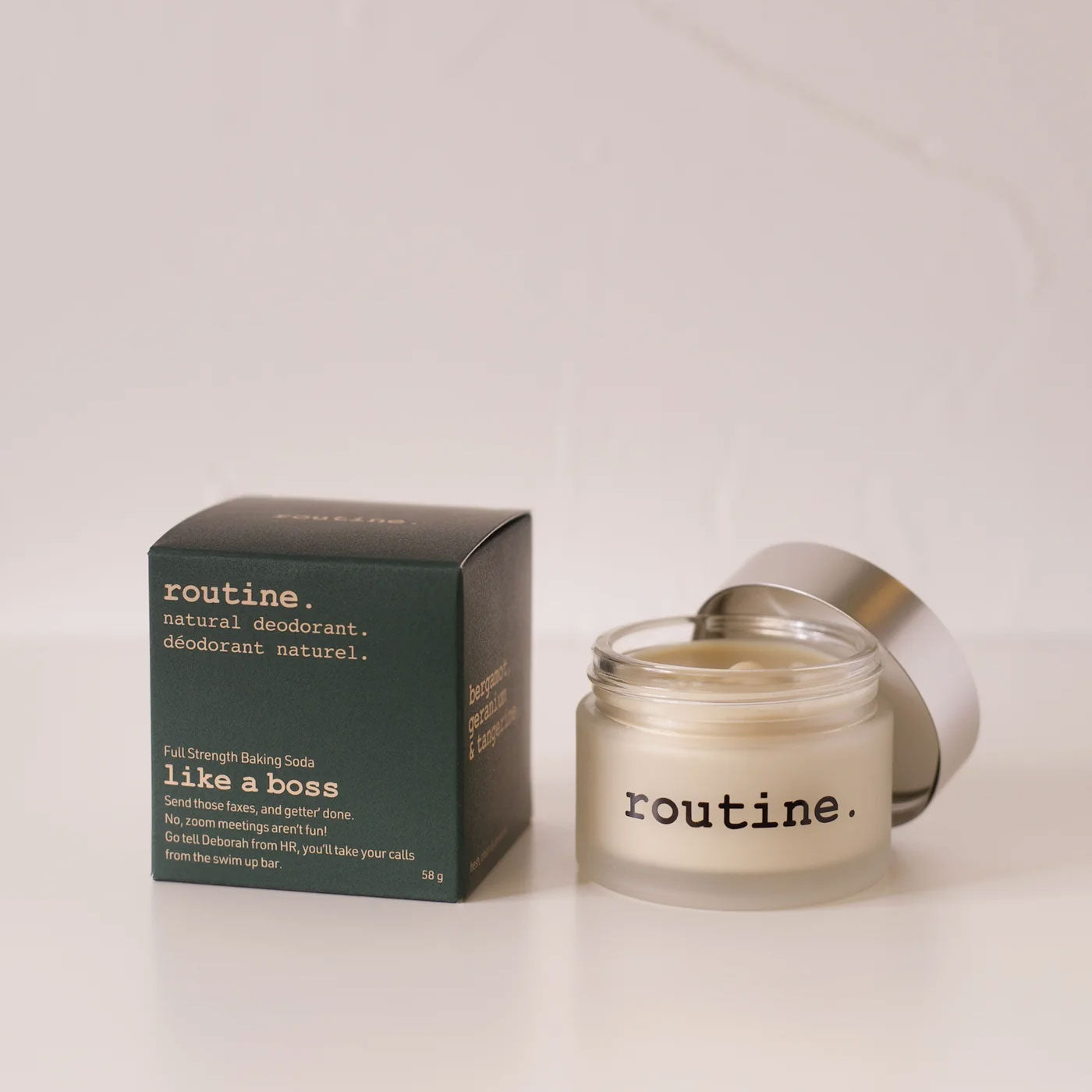 Routine Like a Boss natural deodorant - 58g glass jar with green packaging box showing cream-coloured deodorant formula - maximum strength baking soda formula for non-sensitive skin
