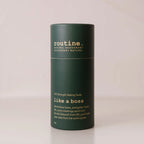 routine. Like A Boss Deodorant Stick being displayed on a clean surface showing recyclable paperboard tube.