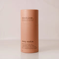 Sexy Sadie Natural Deodorant stick on a white countertop showing minimalist eco-friendly packaging.