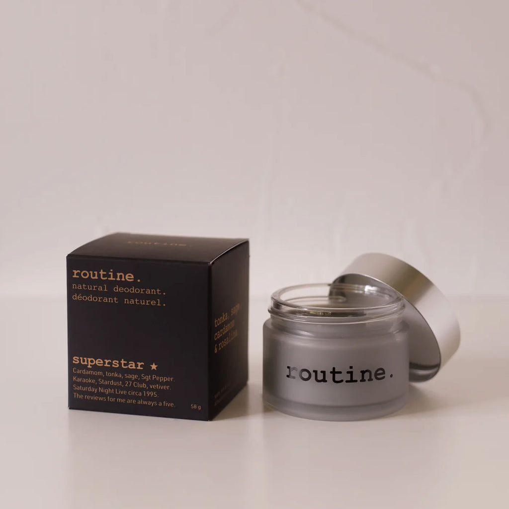 routine Superstar natural deodorant jar with black packaging - frosted glass container showing charcoal-infused cream formula for multi-area odour protection