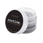 r
routine Superstar deodorant jar opened showing dark grey cream texture - activated charcoal and prebiotic formula with warm tonka sage scent for sensitive skin