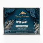 Front of Tommy Bahama Lime & Coconut Bar Soap for Men box featuring gold marlin logo, palm leaf illustration, and "lime & coconut" scent label on teal background