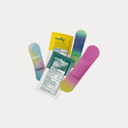Three bright, tie-dye patterned bandages grouped with green and yellow Welly first aid packets.
