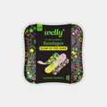 Welly Glow Party 39-count flex fabric bandages tin with neon glow-in-the-dark patterns on black packaging