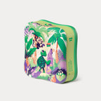 Three-quarter view of the metal tin decorated with a colorful jungle scene of a monkey, toucan, and a turtle.