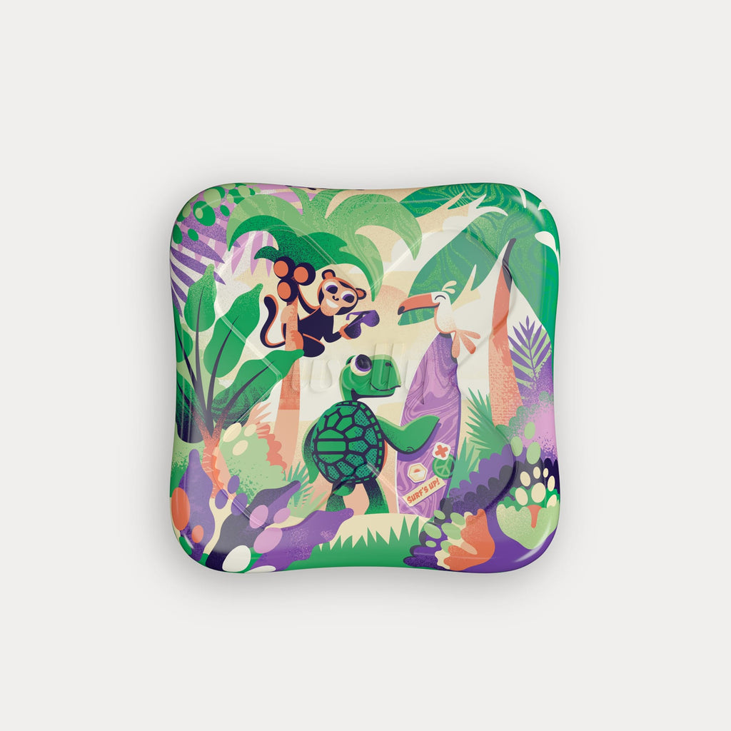 Front view of the decorated metal tin showing a colorful cartoon illustration of jungle animals.